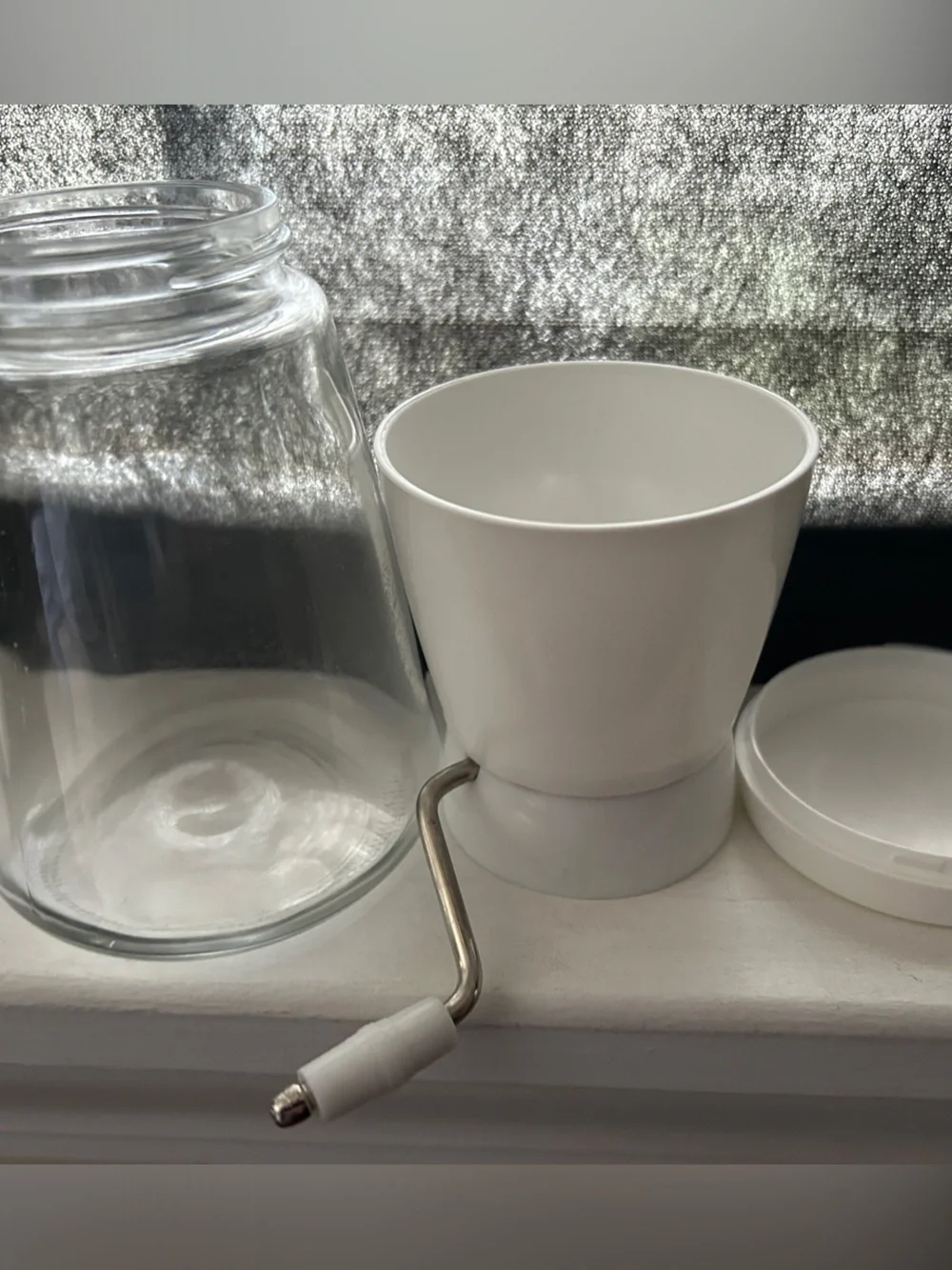 Manual Coffee Grinder with White Top and Clear Glass Carafe